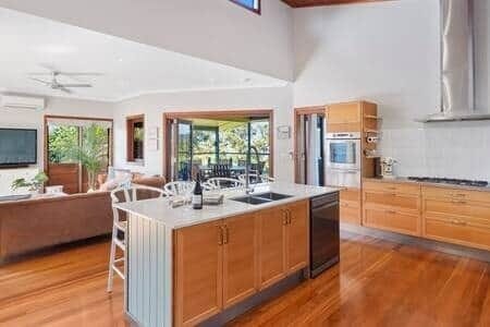 Large fully equipped kitchen with stunning architectural racked ceilings.