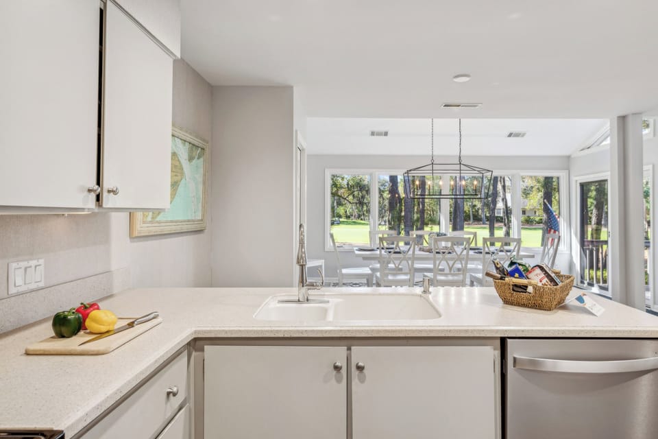 Open-concept layout with a cozy seating area for morning coffee.