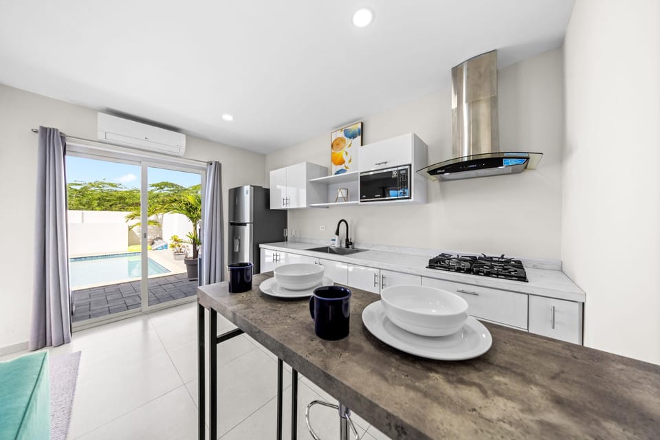Modernand fully equipped kitchen with a view.