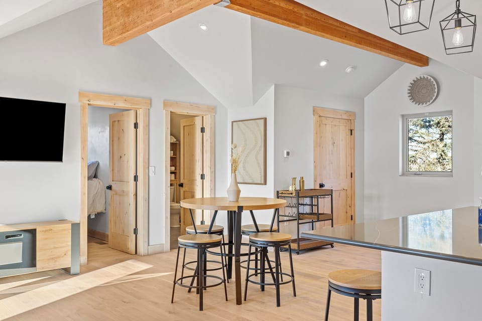 The open dining area offers a spacious, inviting space to share meals.