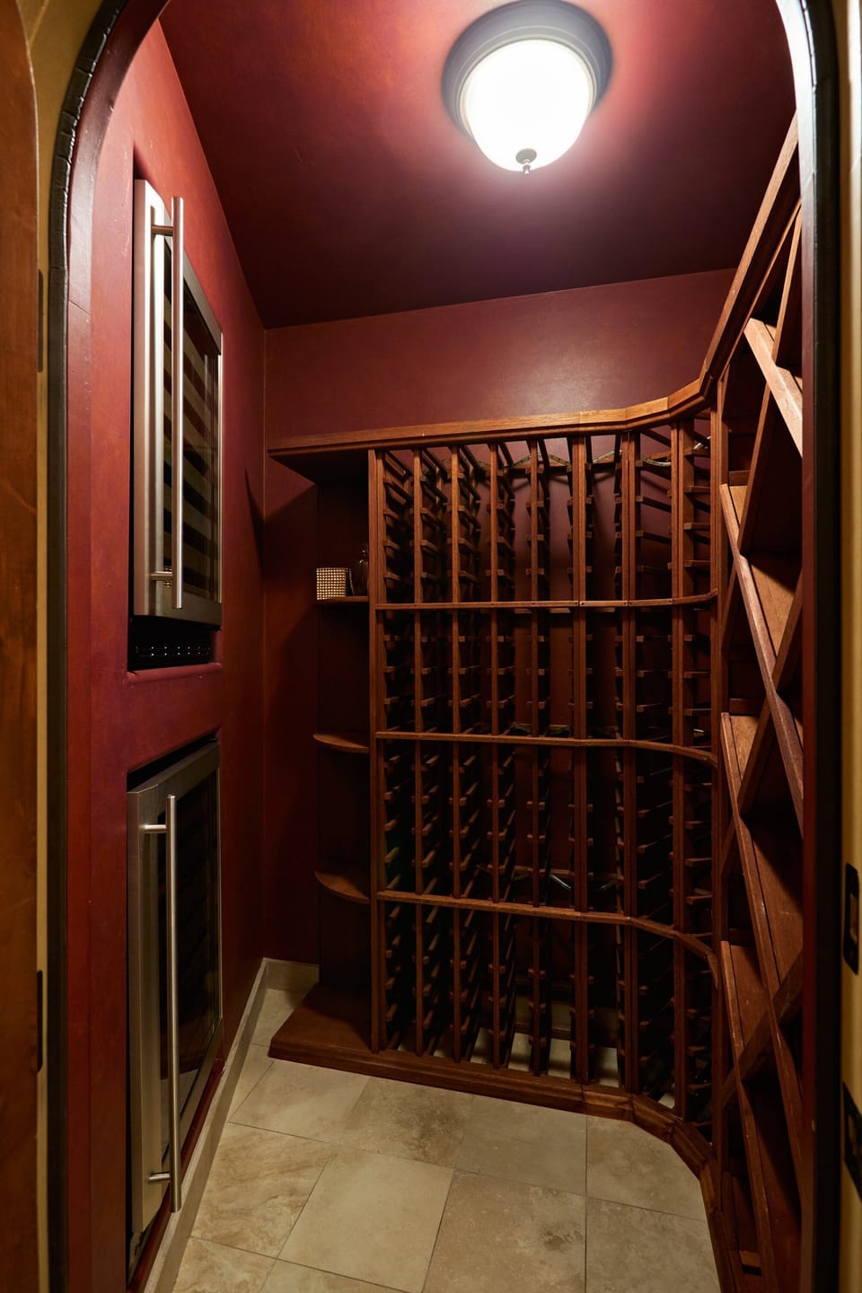 A dedicated wine cellar with wine fridges provides the perfect space to store and enjoy your favorite selections.