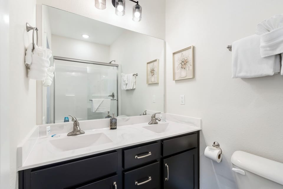 Bathroom attached to Bedroom 1-With a Step-In Shower