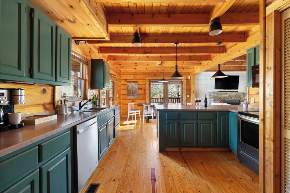 Spacious kitchen with lots of cabinets.