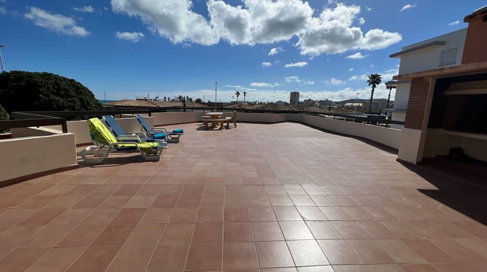 Cloud, Sky, Building, Road Surface, Shade, Asphalt, Wood, Outdoor Furniture, Urban Design, Floor