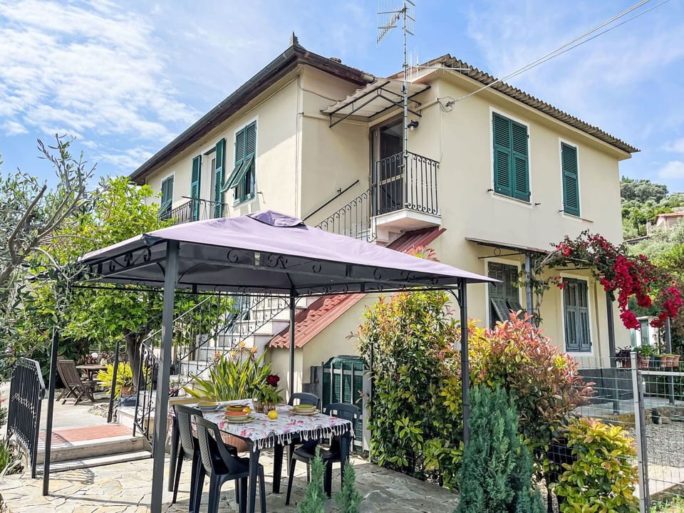 Umbrella, Shade, Canopy, Awning, Outdoor Structure, Outdoor Furniture, Chair, Houseplant, Balcony, Porch