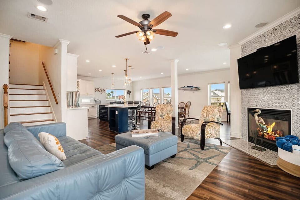 Curl up with a good book in the inviting living room