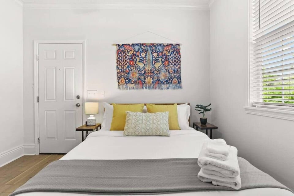 Master bedroom with Roku TV, comfy queen bed, full en suite bath & access to porch and backyard