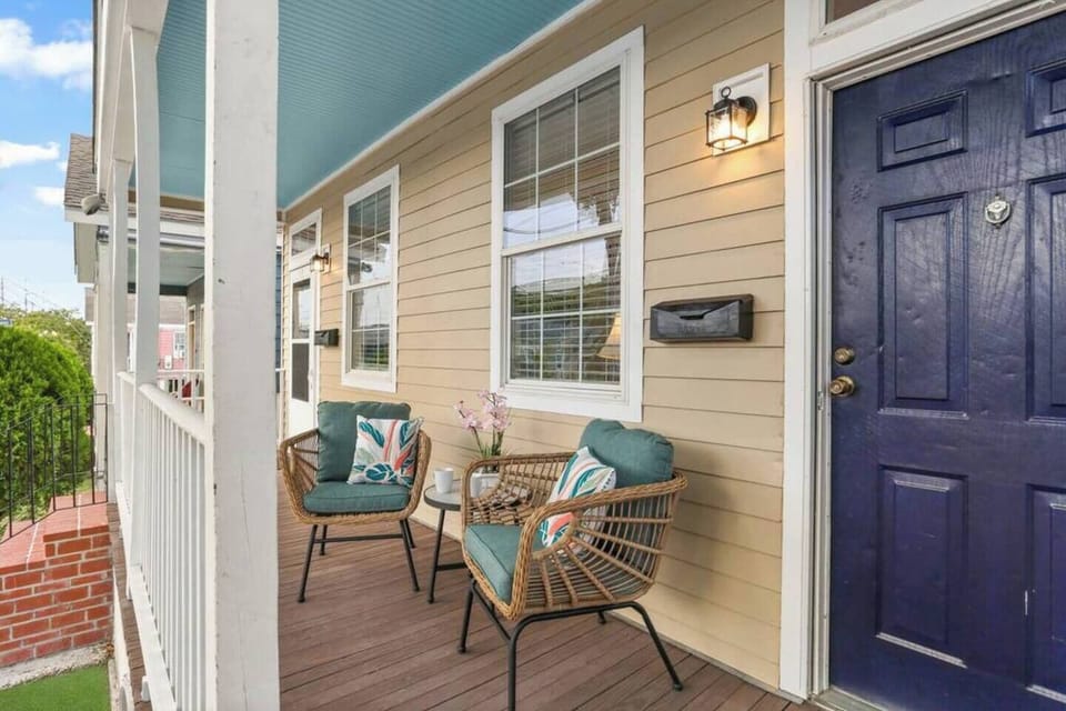 Front porch living at it's finest! Enjoy your retreat from the action in a quiet, safe neighborhood