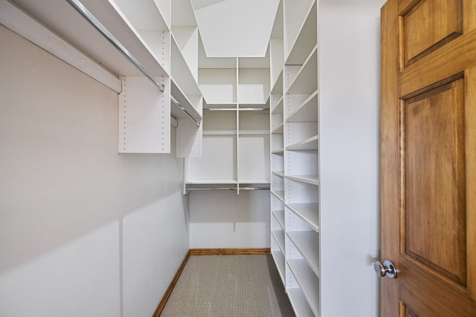 Large walk-in closet in primary bathroom