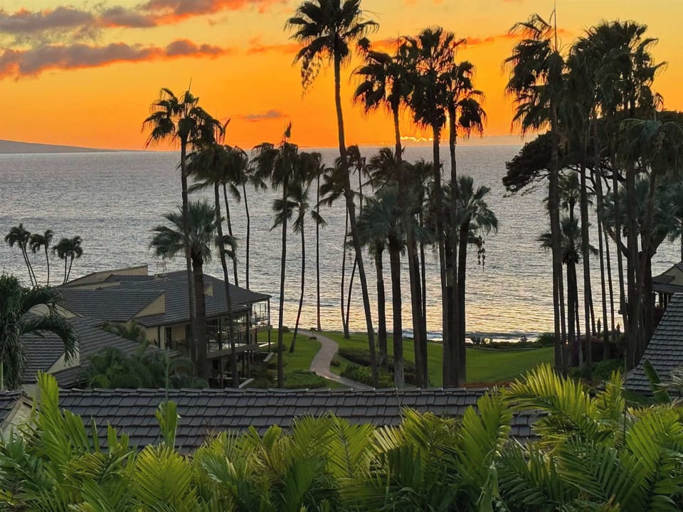 Every evening ends with a golden sky over the Pacific from your lanai