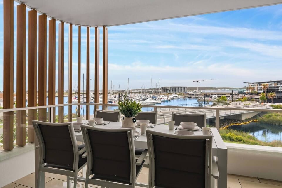 Enjoy al fresco meals on the private balcony, offering stunning views of the marina and surrounding area.