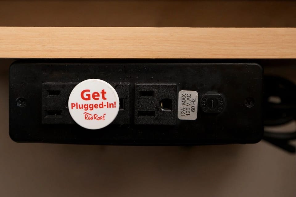 Plug in devices easily with convenient bedside power access.