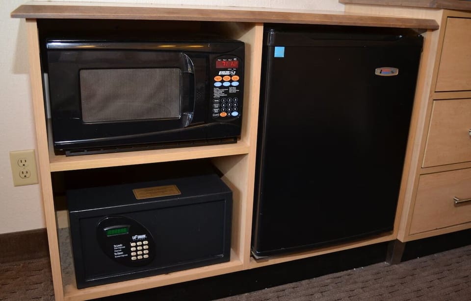Enjoy added convenience with mini-fridge, microwave, and in-room safe.