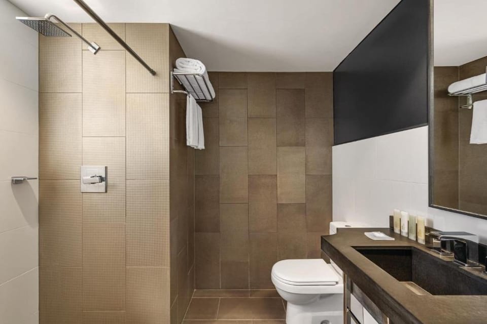 Refresh in a sleek walk-in shower with spa-like finishes.