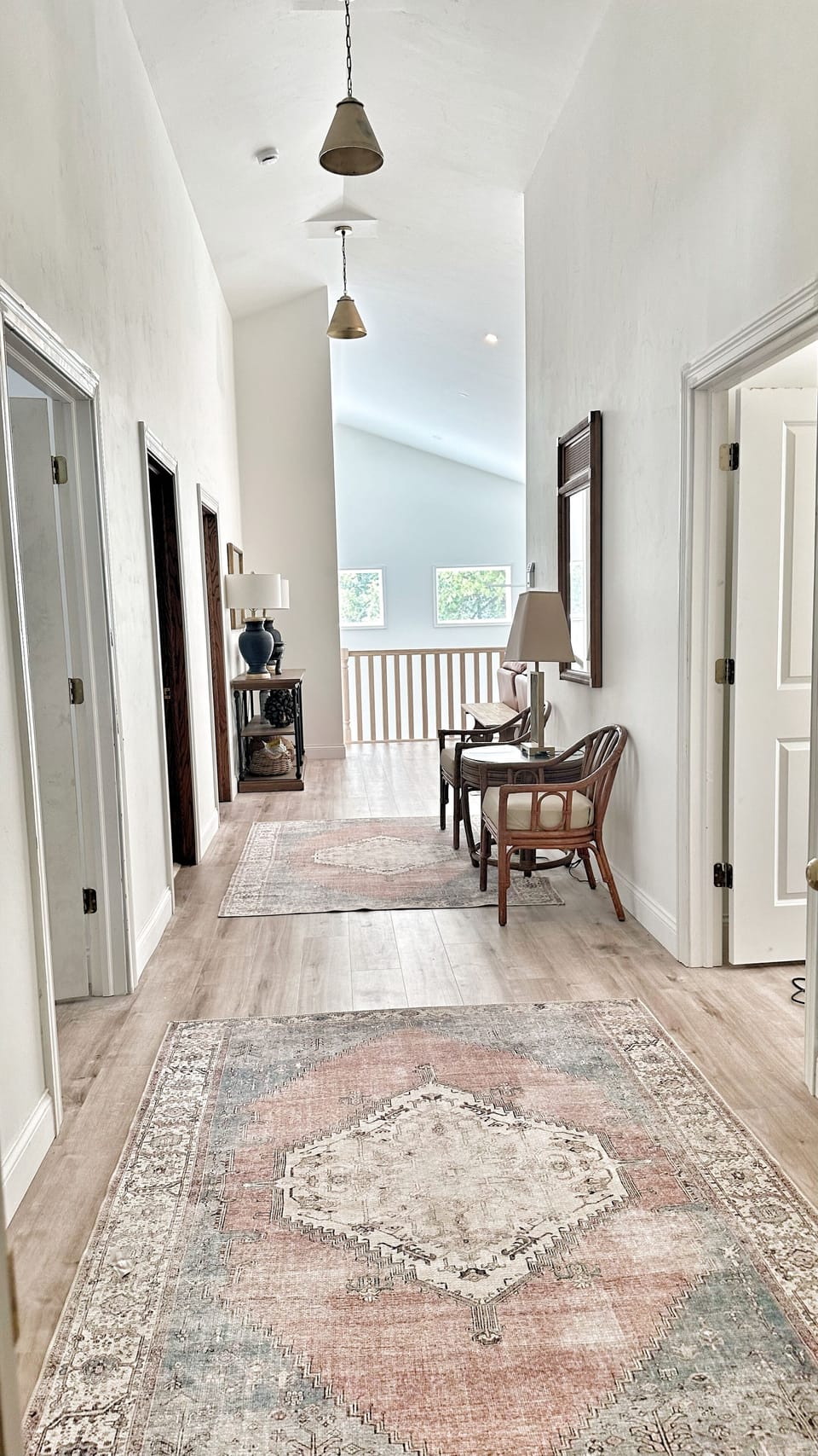Second floor vaulted landing/hallway.