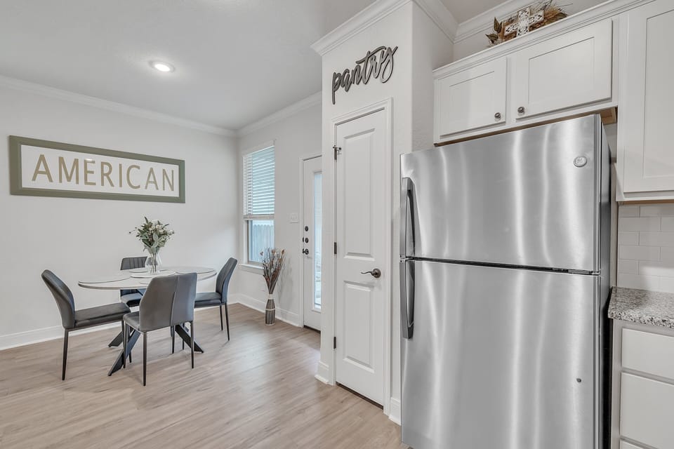 Indoors, Floor, Refrigerator, Flooring, Chair