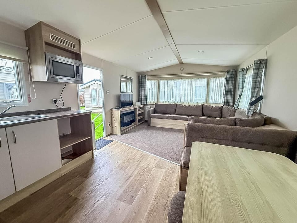 This cosy, family-friendly setup provides the ideal space to enjoy a home-cooked dinner or plan tomorrow's adventures.