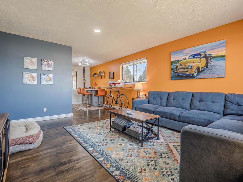 There's no shortage of comfortable spaces to relax - there's even a cozy bed for the dog!