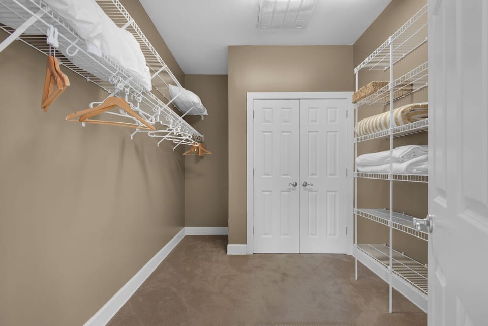 WALK IN MASTER BEDROOM CLOSET, EXTRA PILLOWS AND BLANKETS