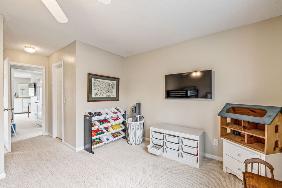 Play area has toys for boys and girls for rainy days or evening fun!