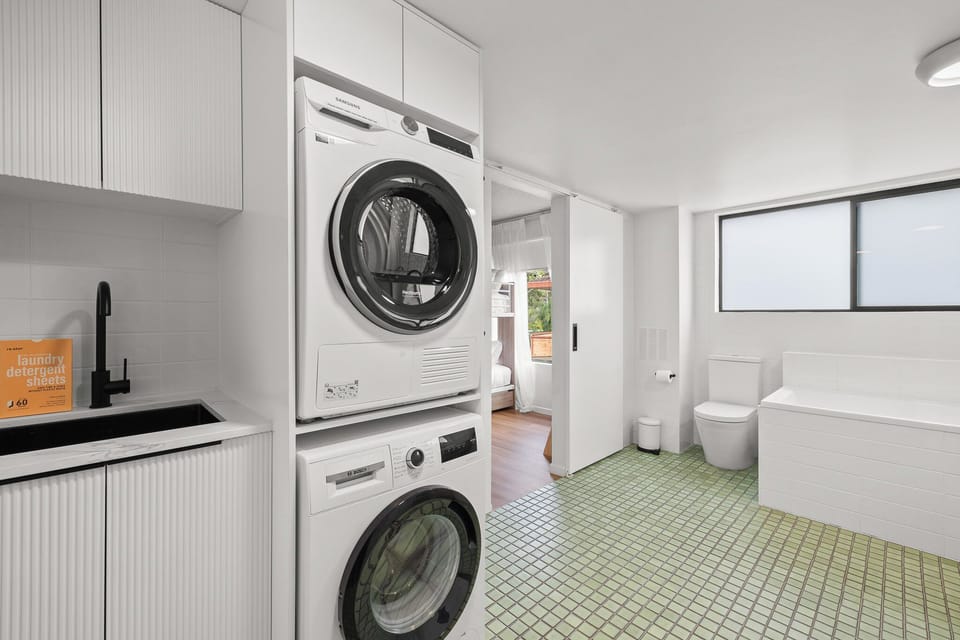 Full laundry with washing machine, dryer and washing machine sheets provided