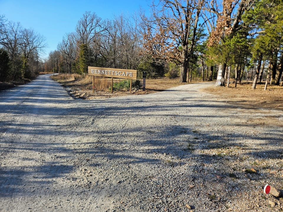 Please enter on our property by the driveway and park in the gravel parking area