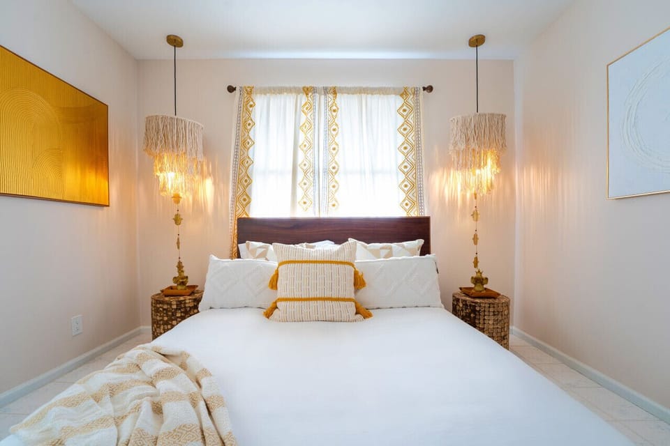 Experience ultimate relaxation in our chic and cozy bedroom.