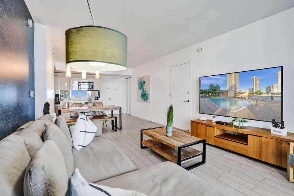 Cozy open space living room with city and Canal view