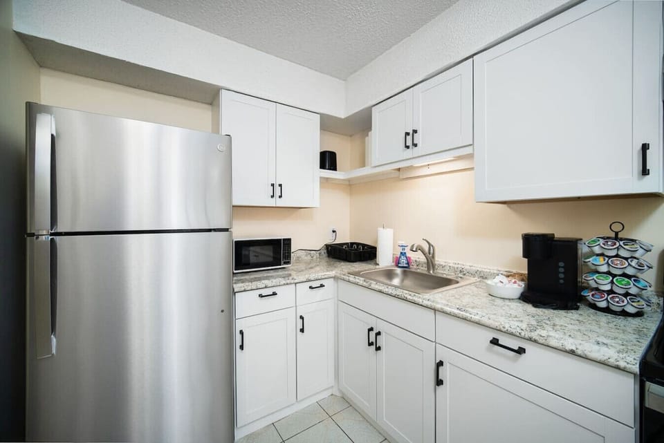 Discover culinary joy in this thoughtfully equipped kitchen.