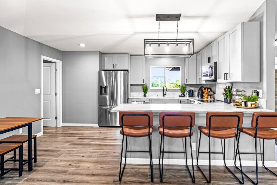Well-equipped kitchen with modern appliances and a stylish layout.