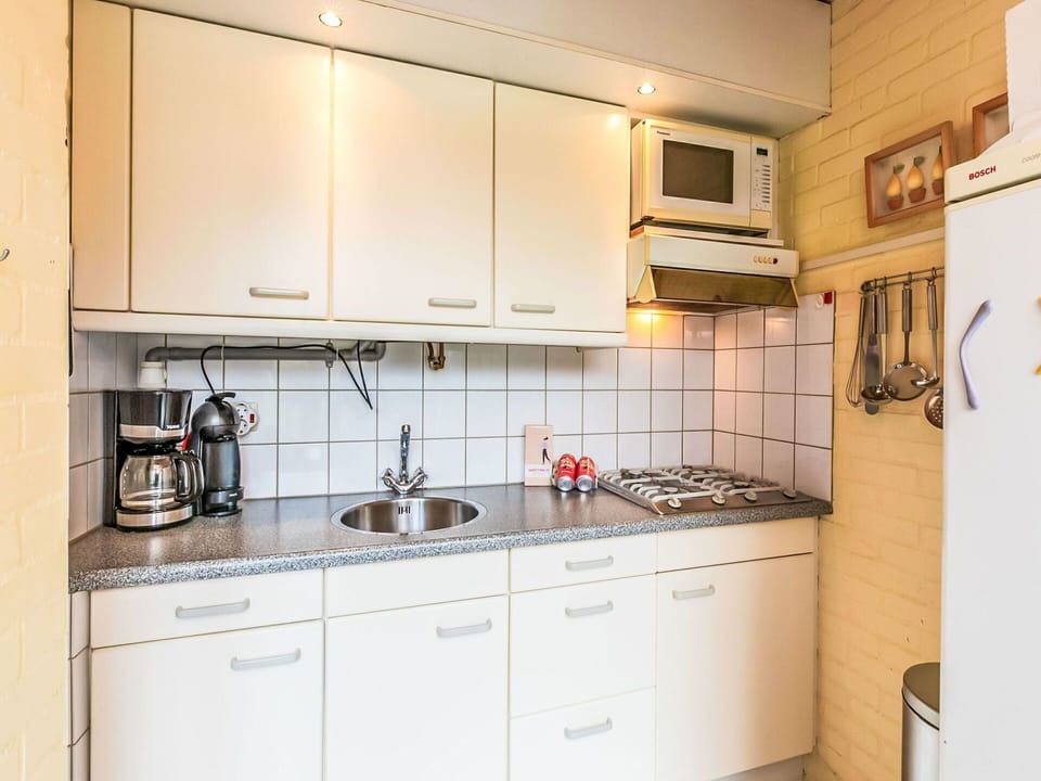 Countertop, Kitchen, Sink, Kitchen Appliance, Interior Design, Plumbing Fixture, Major Appliance, Flooring, Tap, Floor
