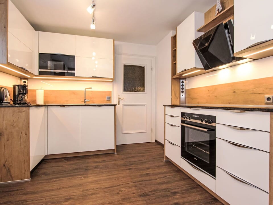 Flooring, Interior Design, Wood, Furniture, Countertop, Cabinetry, Kitchen, Floor, Wood Flooring, Kitchen Appliance