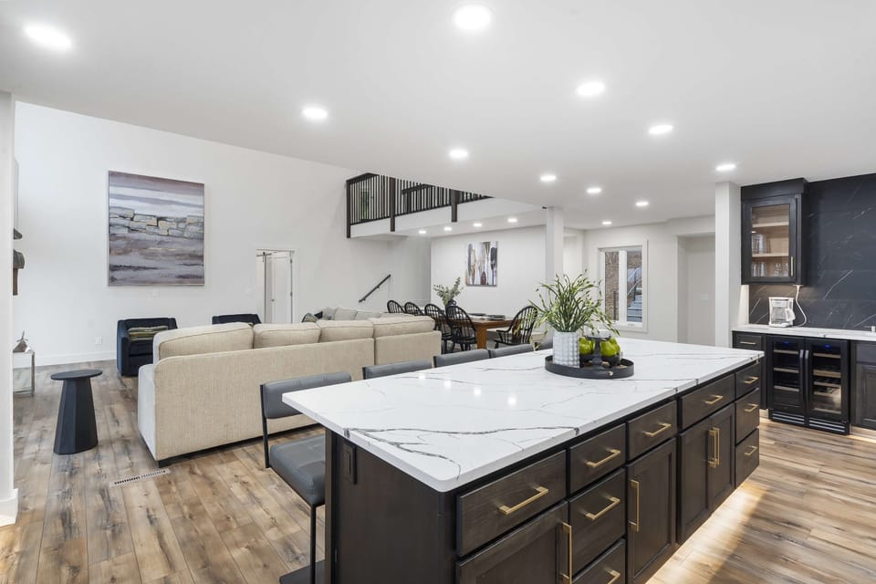 The chic, open kitchen offers ample space & every home comfort