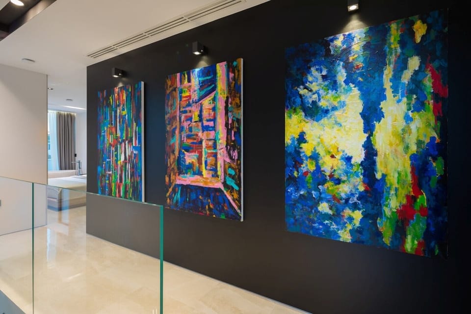 Interior decor in hallway on leading to fully air-conditioned en-suite double bedroom in luxury Villa Calmissima 2 