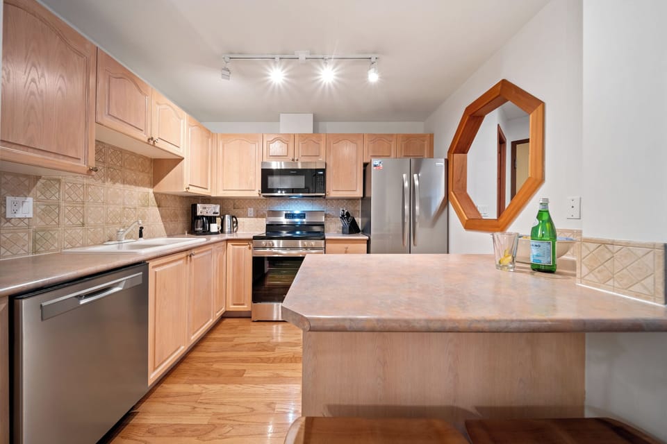 The kitchen features ample counter space for comfortable meal cooking. 