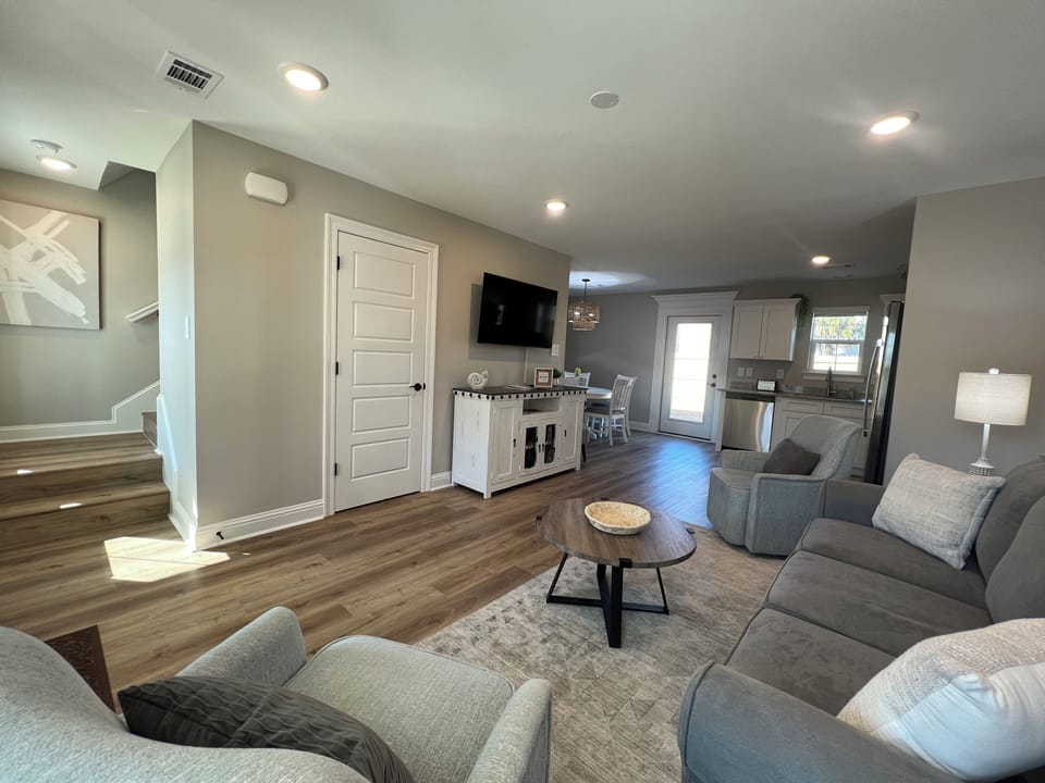 Ariel view of downstairs from living room area (door by TV leads to 1/2 bath)