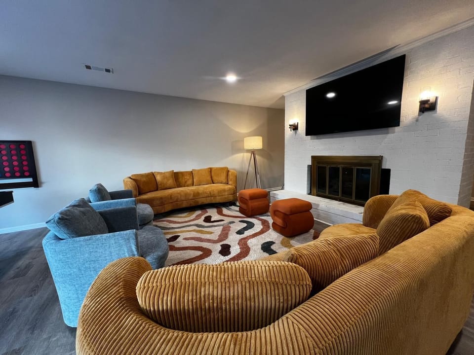 Spacious living area with a TV, great for relaxation and entertainment!