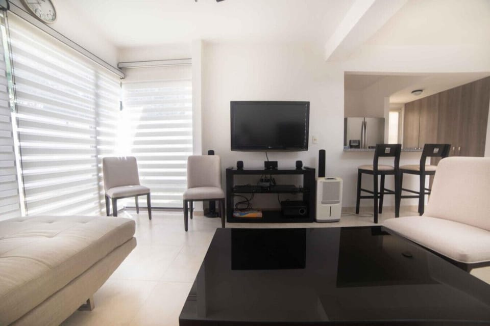 sala de estar con TV