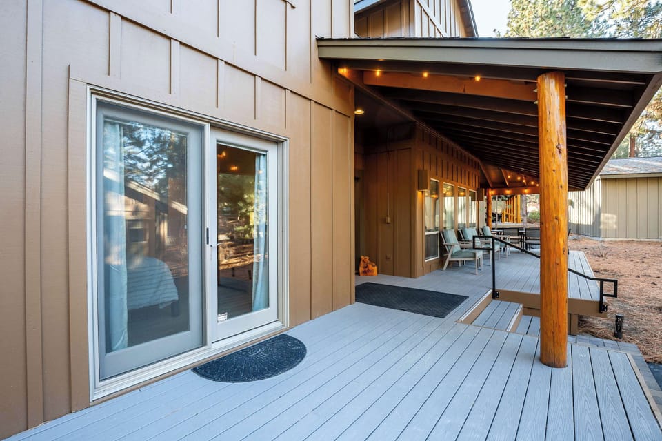 The door from the master bedroom connects to the front porch.