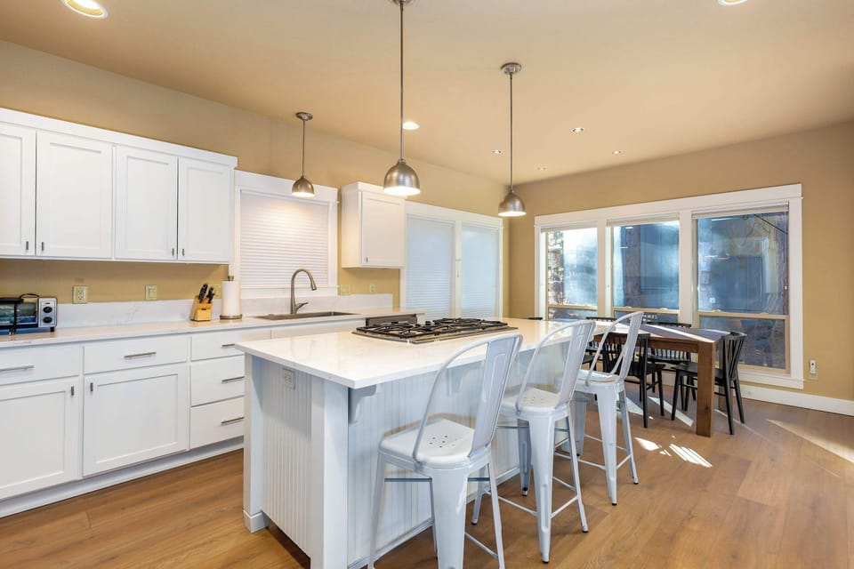 Beautiful modern kitchen with gas stove top.