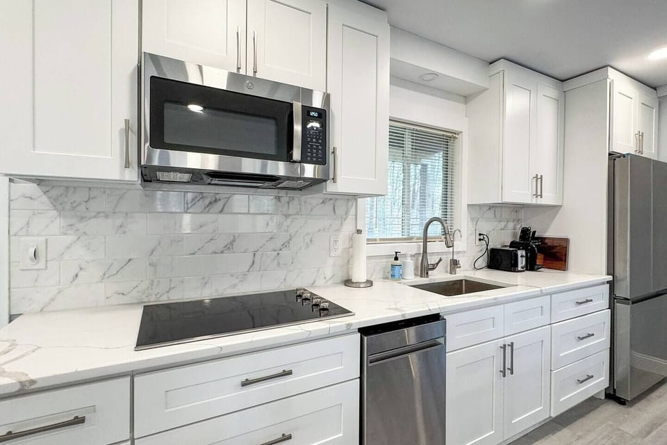 Electric cooktop with over-the-range microwave