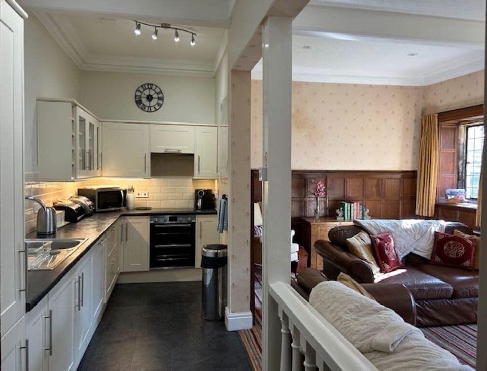 Fully equipped gallery kitchen with open access to the living room