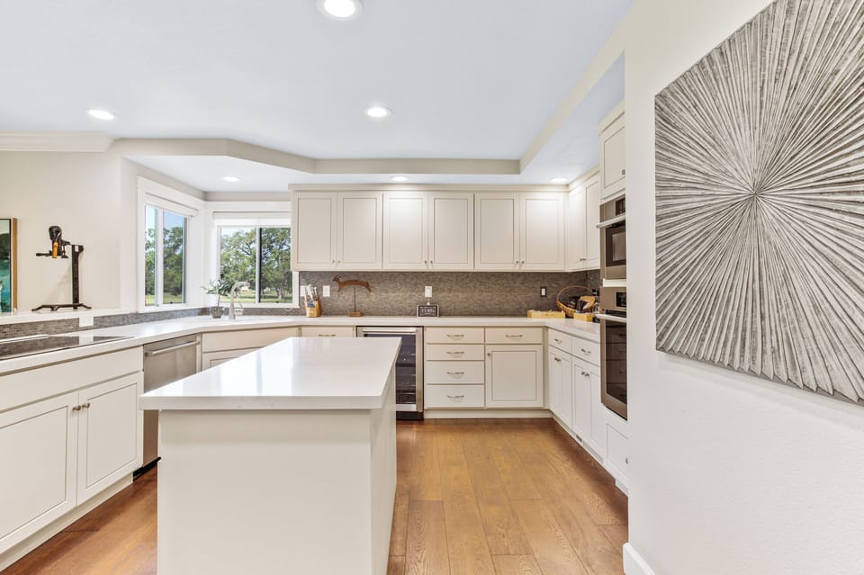 Cook a feast in a chef's kitchen as sunlight streams in