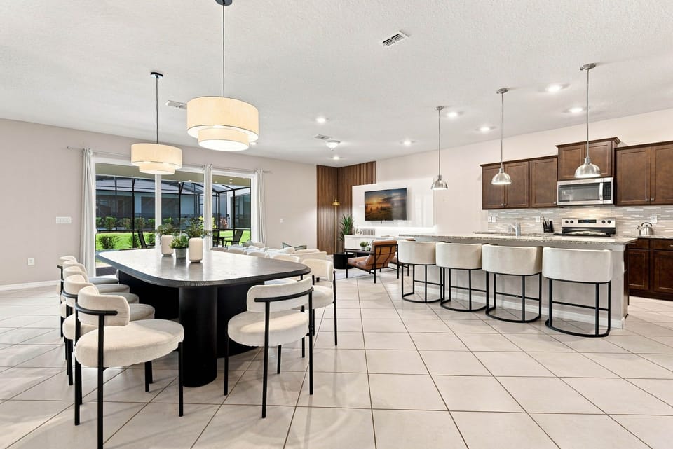 Spacious living room integrated with kitchen and dining area