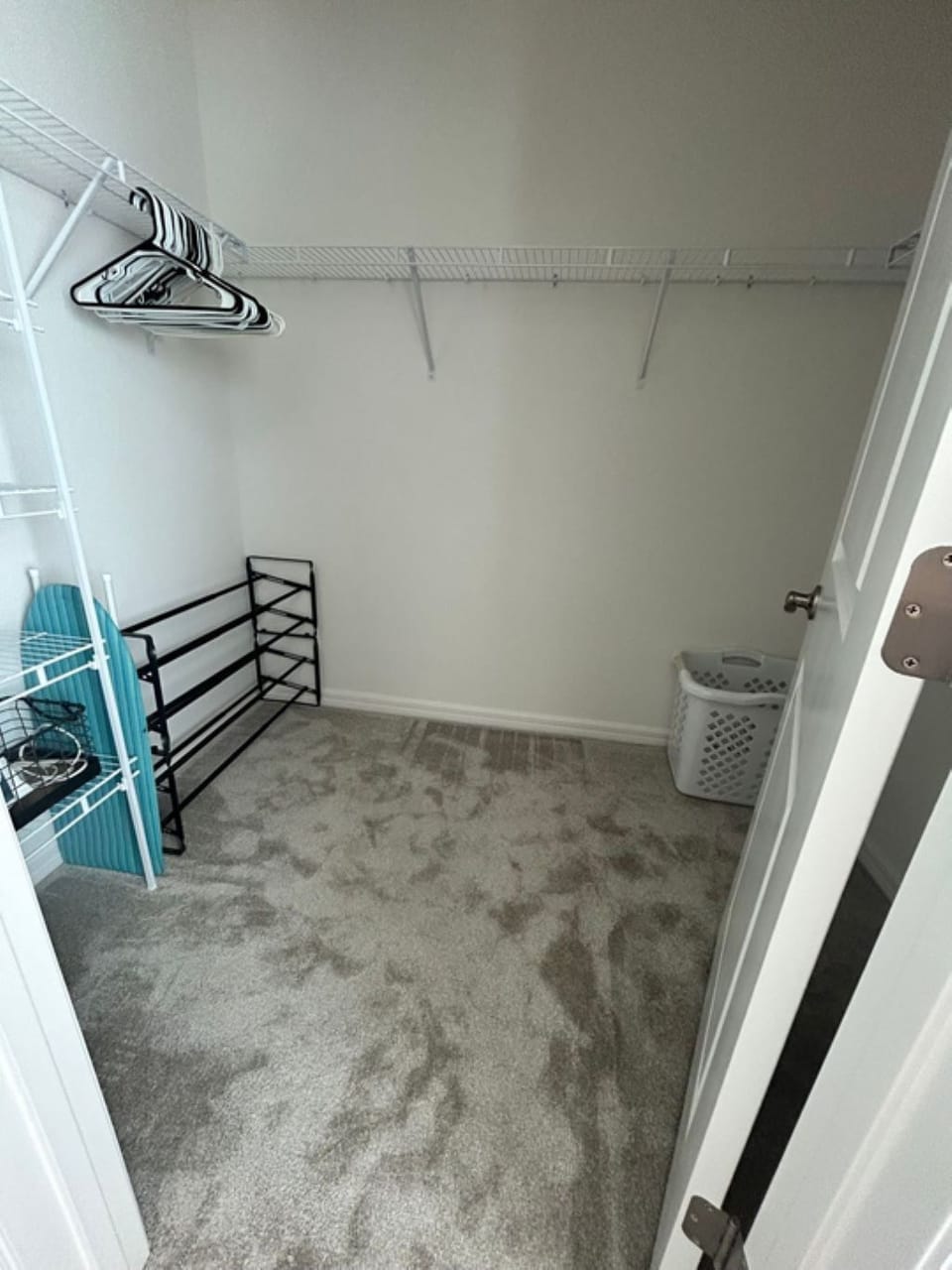 Primary closet:
Hamper, hangers, iron, ironing board, extra pillows and blankets