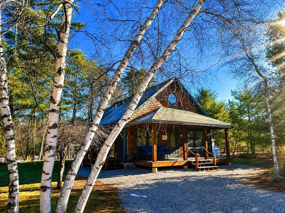 The home nestled between two lakes with stunning views!