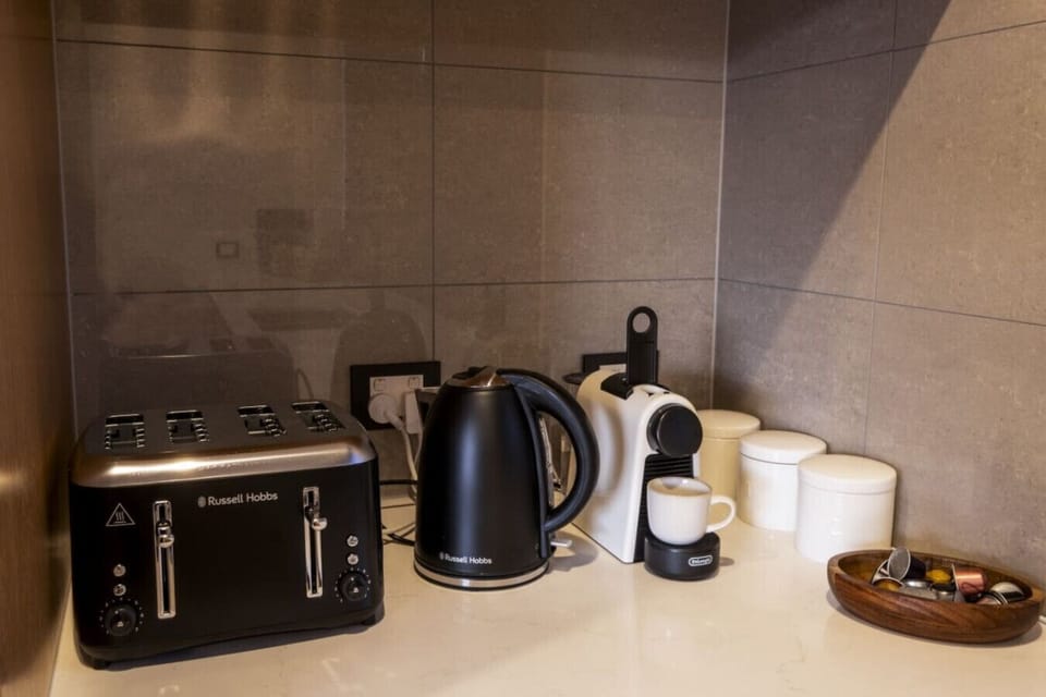 Start your mornings right with your own espresso bar—Russell Hobbs kettle, Nespresso machine, and everything you need for the perfect brew.
