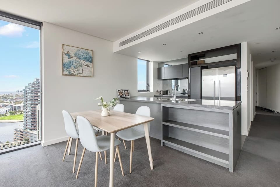 A stylish dining area with scenic views, perfect for enjoying meals with family or friends.