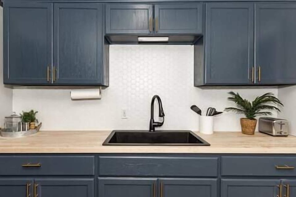 Fully Stocked Newly Renovated Kitchen with butcher block countertop. 