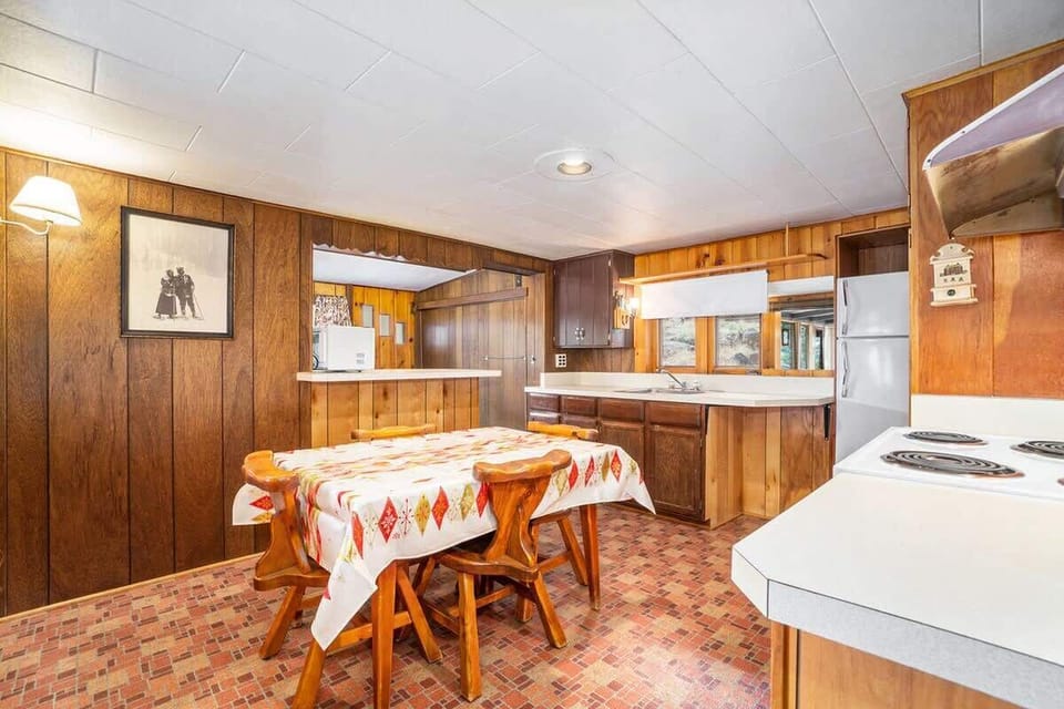 Dining room table with seating for 4 guests.